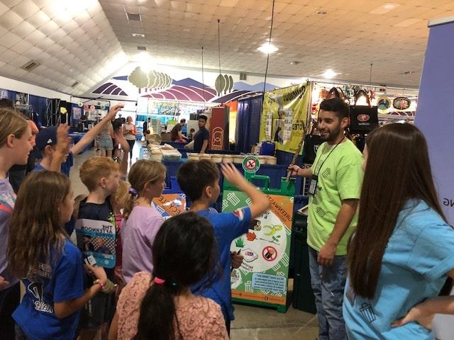 Kids at a fair booth